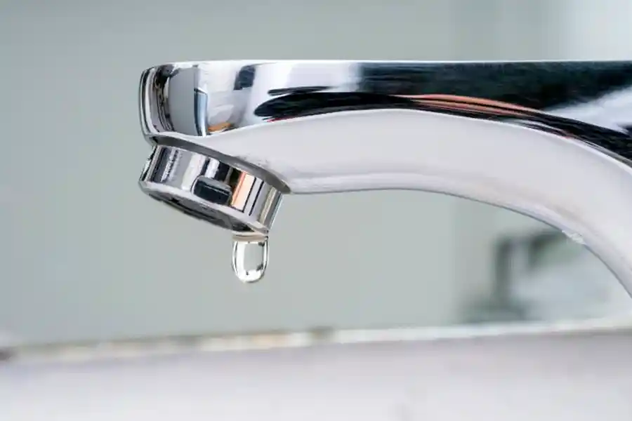 Leaky faucet requiring professional plumber